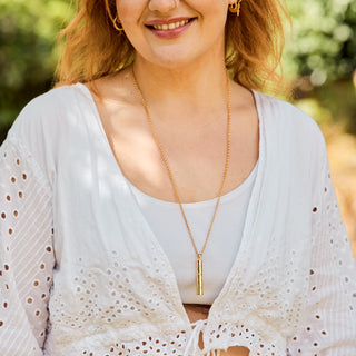 Carrie Elizabeth Breathing Pendant on long chain gold