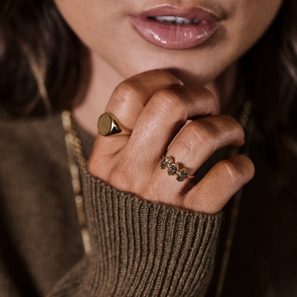 Gold Trilogy ring with gems