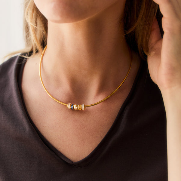 torque necklace in gold