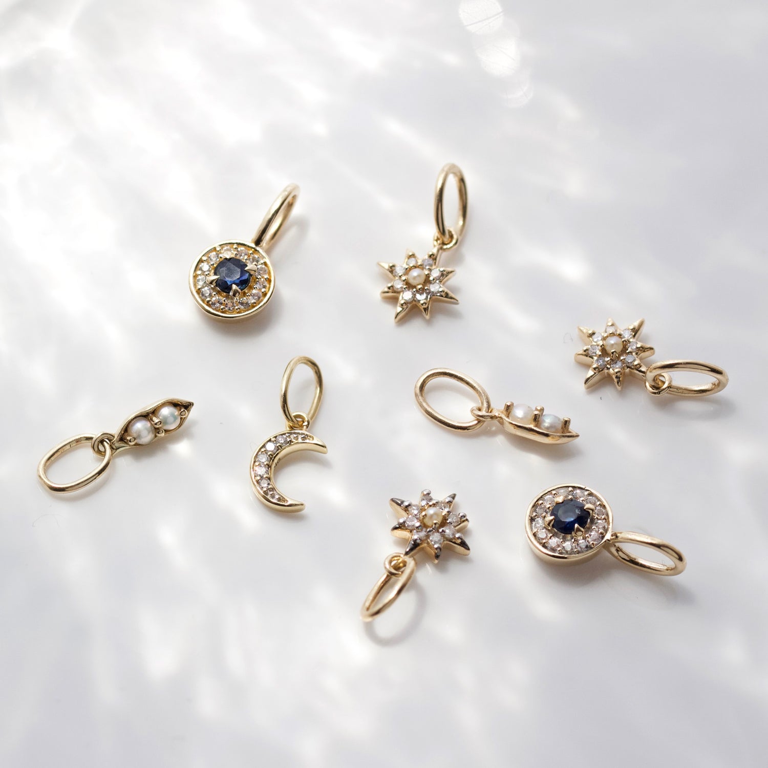 Crescent moon diamond charm in solid gold