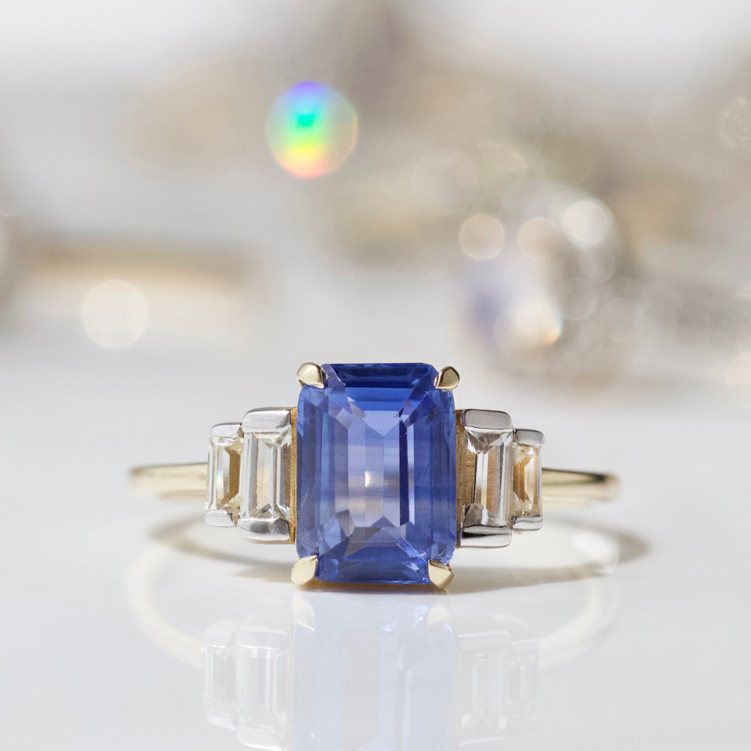 Blue and White sapphire engagement ring in solid gold