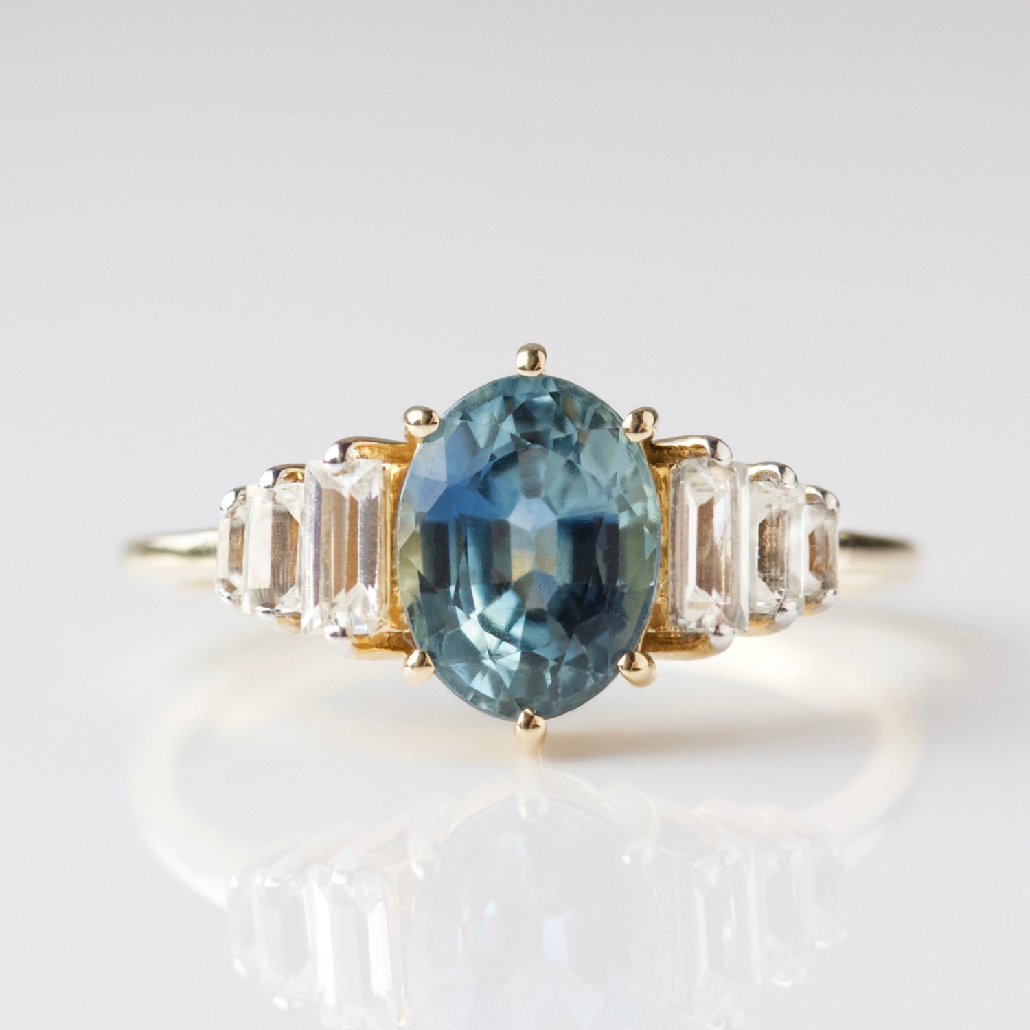 teal and white sapphire baguette ring in solid 14k gold