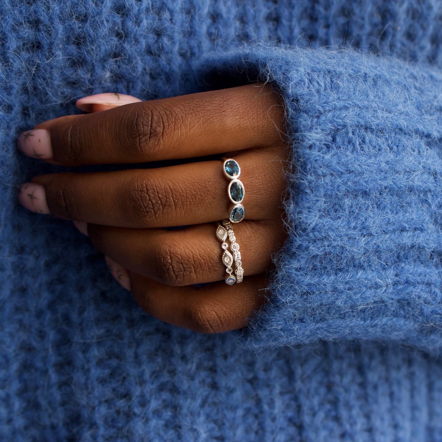 white topaz and diamond trapeze ring in silver
