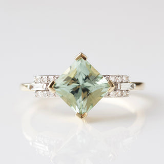 green tourmaline and diamond engagement ring in solid 14k gold