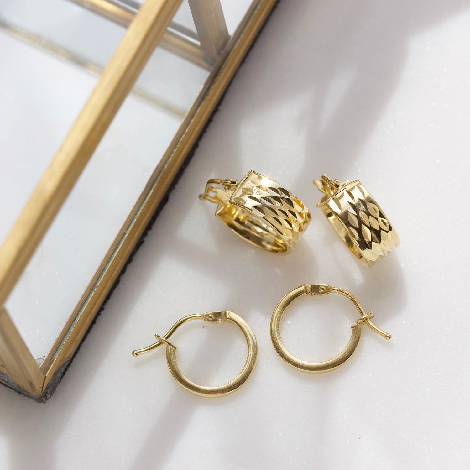diamond cut hoop earring in solid 9k gold 