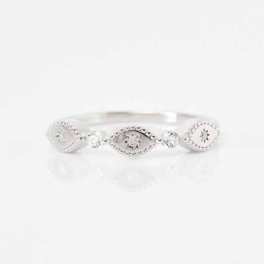 white topaz and diamond trapeze ring in silver