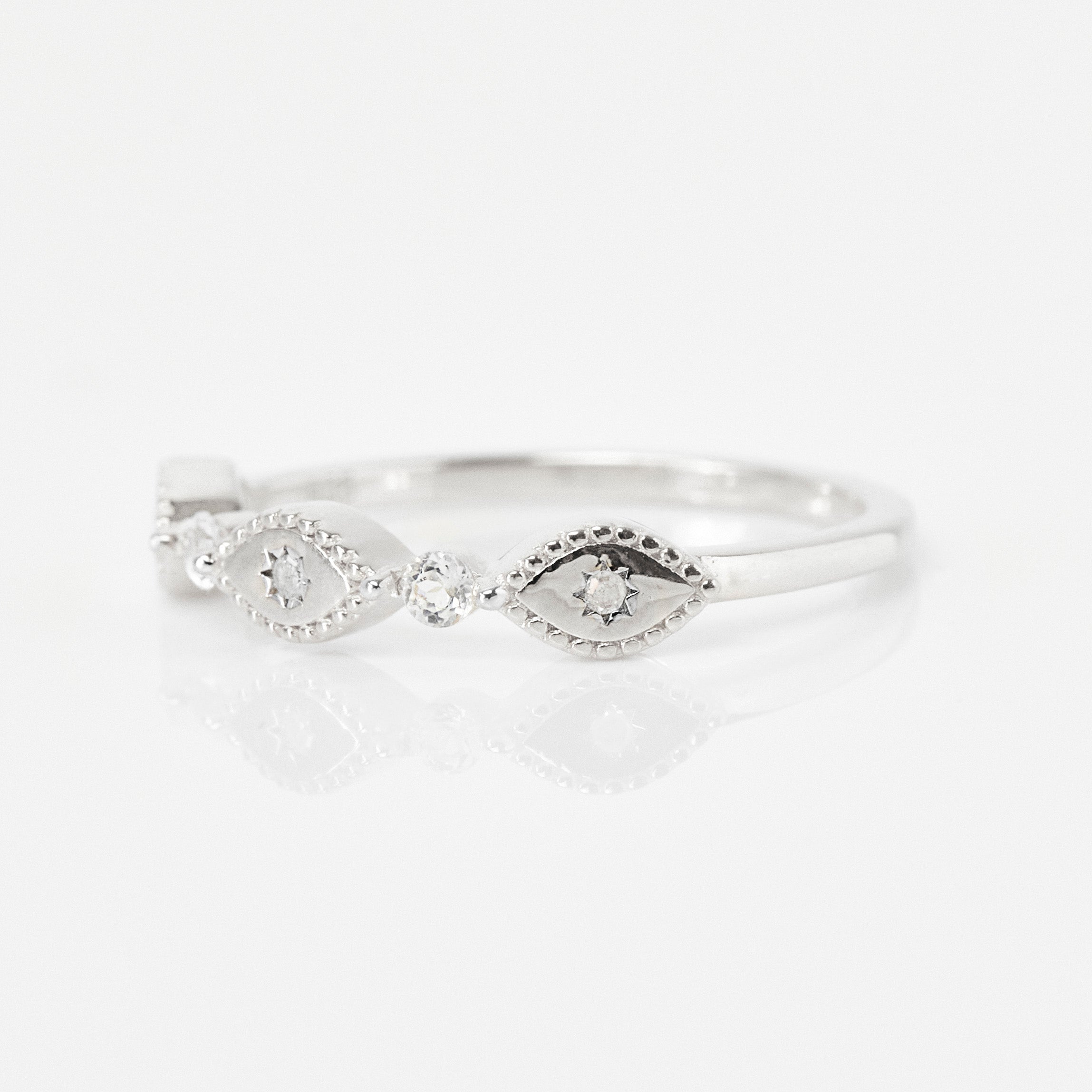 white topaz and diamond trapeze ring in silver