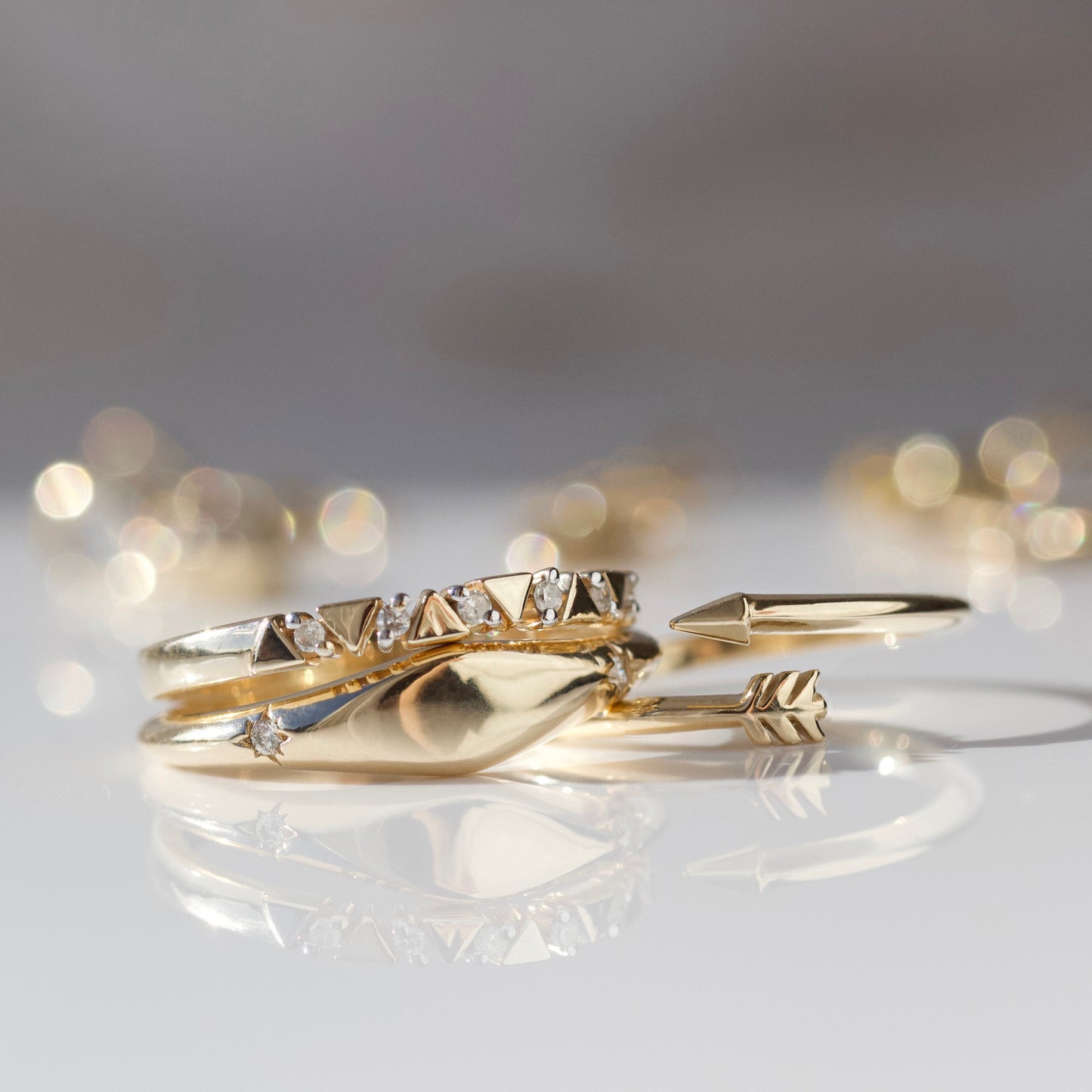 Solid gold cupids arrow ring 