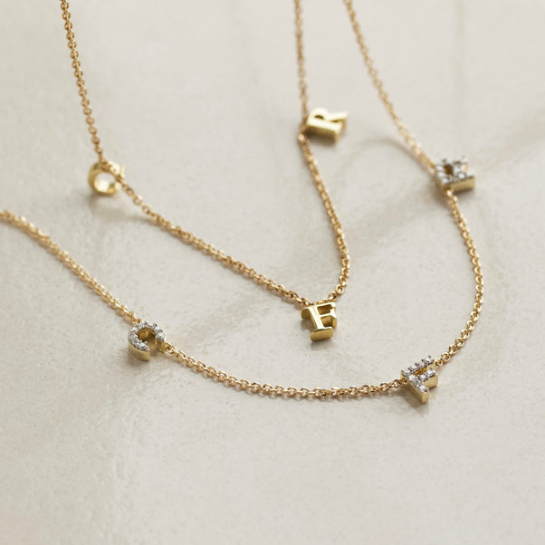 carrie elizabeth diamond initial personalised necklace in solid gold