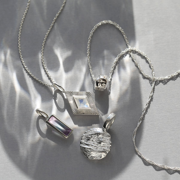 molten texture coin pendant silver
