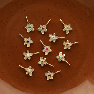 Birthstone flower charms in solid gold