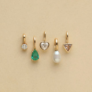 Diamond charm in solid gold