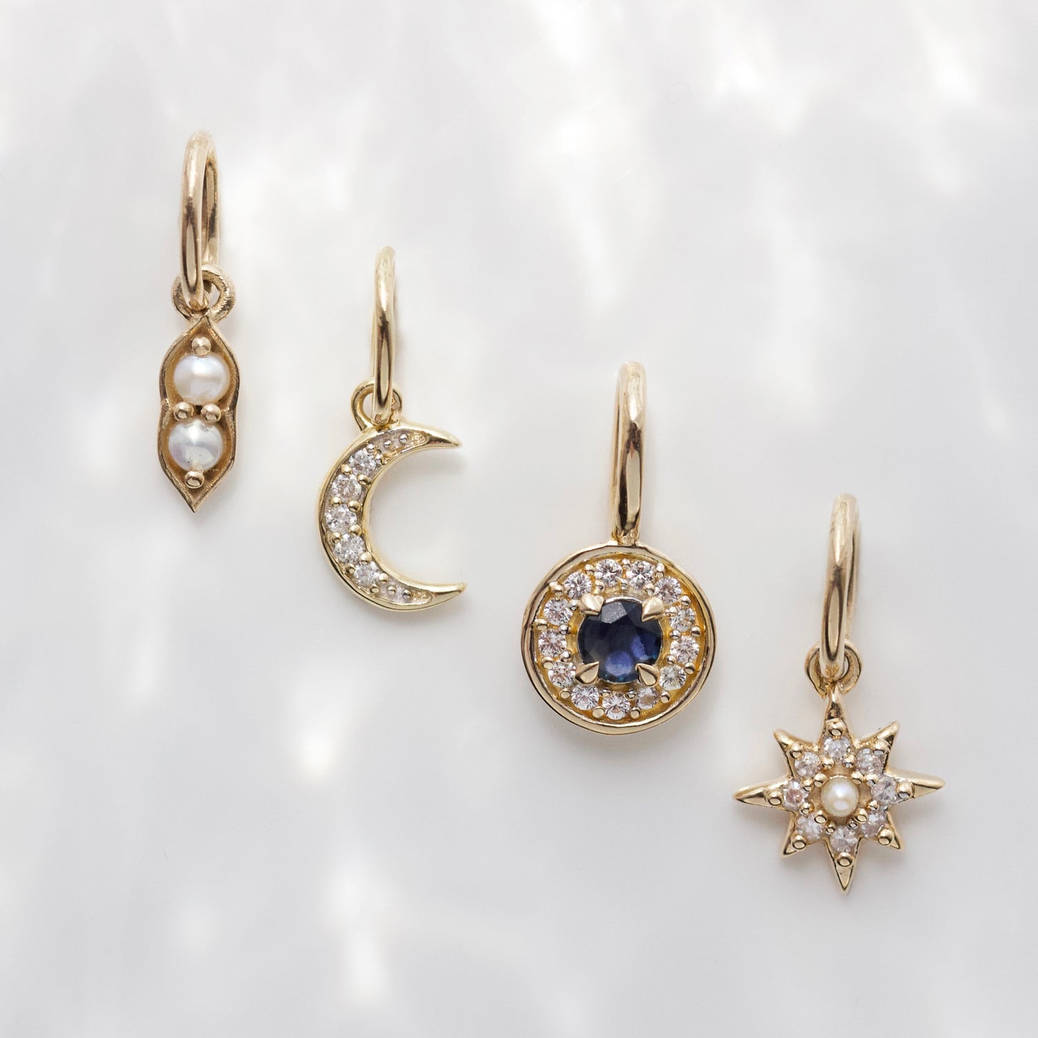 Crescent moon diamond charm in solid gold