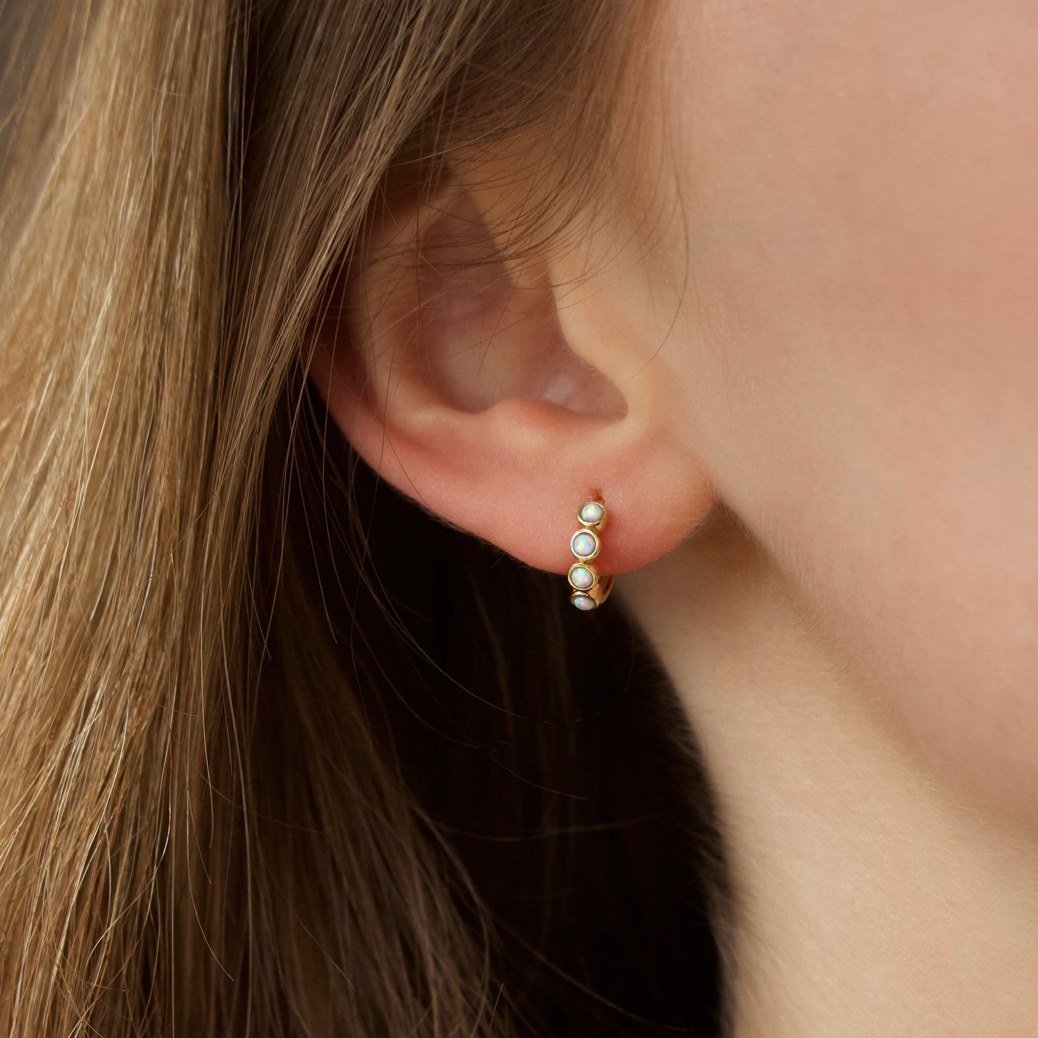 carrie elizabeth opal hoop earring in solid gold 