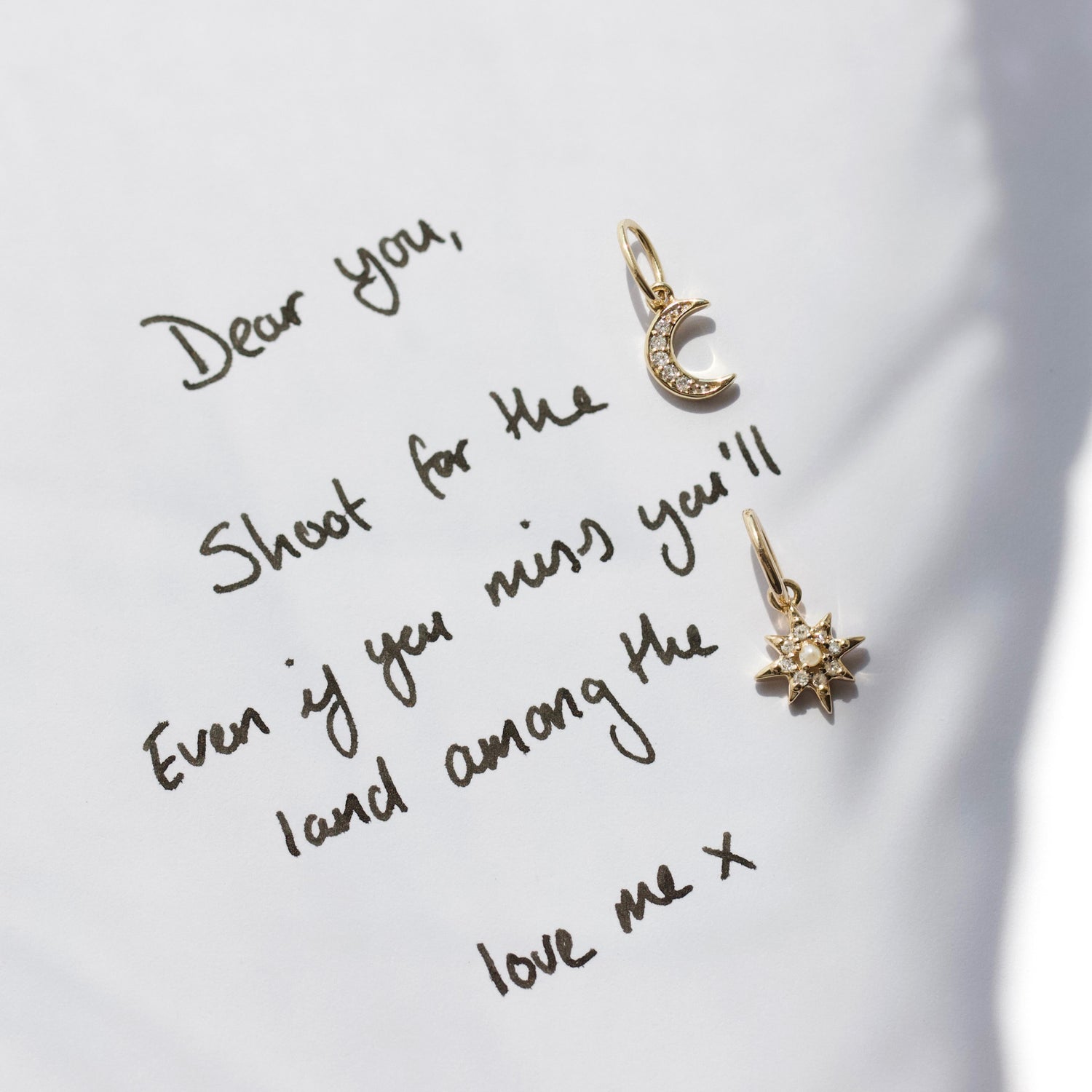 diamond and pearl vintage star charm in solid gold