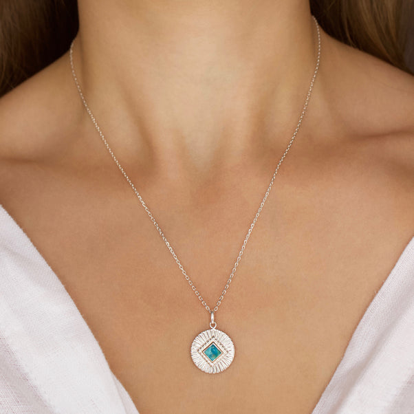 turquoise sunray coin necklace in silver