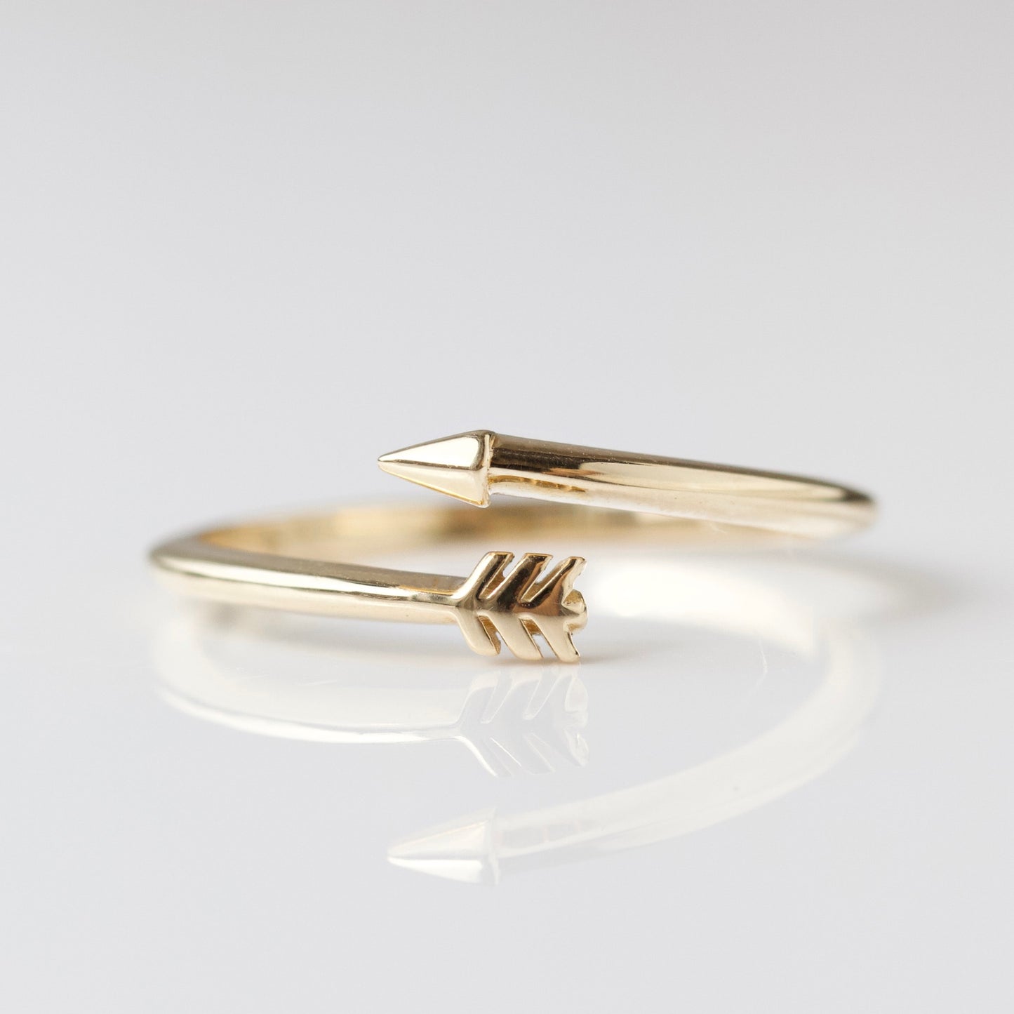 Solid gold cupids arrow ring 