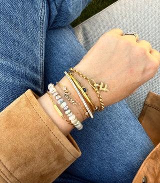 Carries Bracelet stack Albert Bracelet with initial charm, chunky beads, bangles