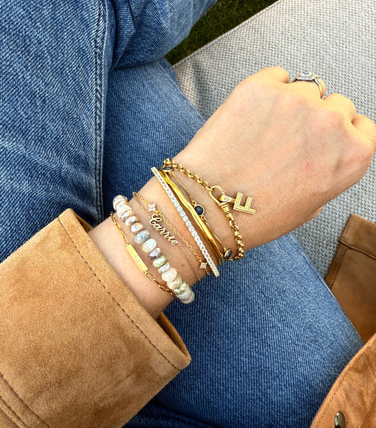 Carries Bracelet stack Albert Bracelet with initial charm, chunky beads, bangles