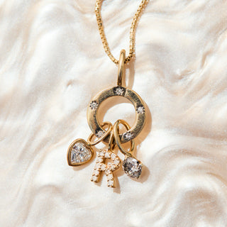 9k gold diamond charm