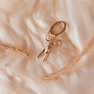 solid gold pair of scissors