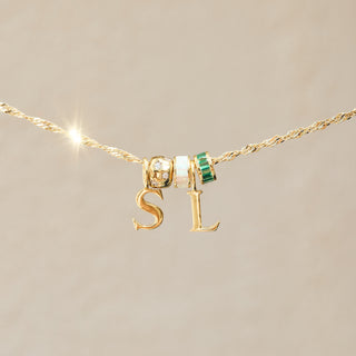 CE gold letter charm
