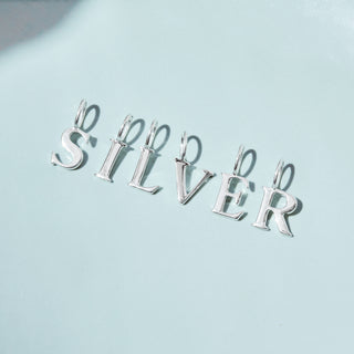 silver intial charm