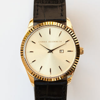 watch with black leather strap