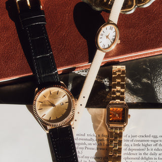 gold watch square face