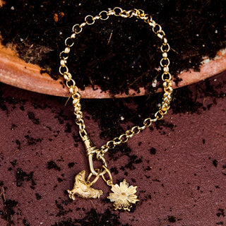 gold flower charm carrie elizabeth