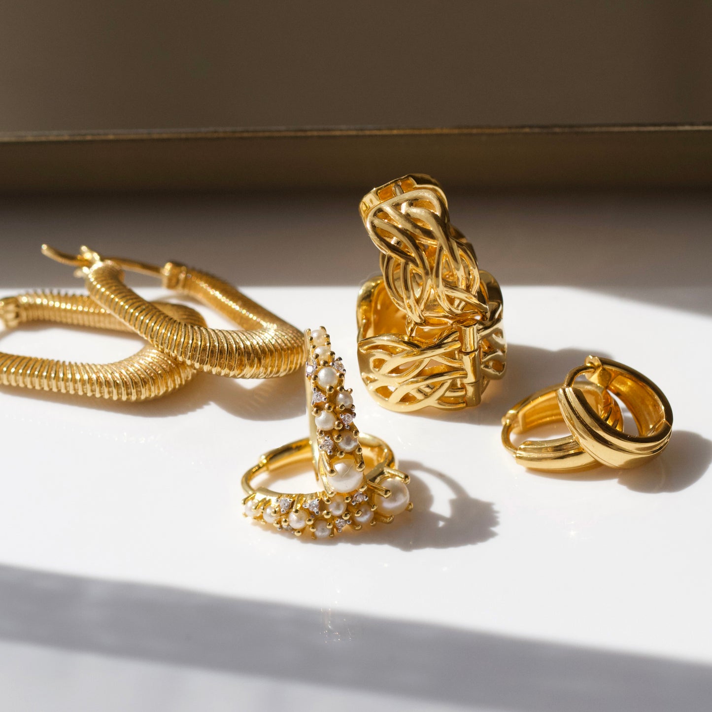 classic vintage huggie hoop earrings in gold