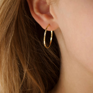 Diamond cut solid gold hoop earrings