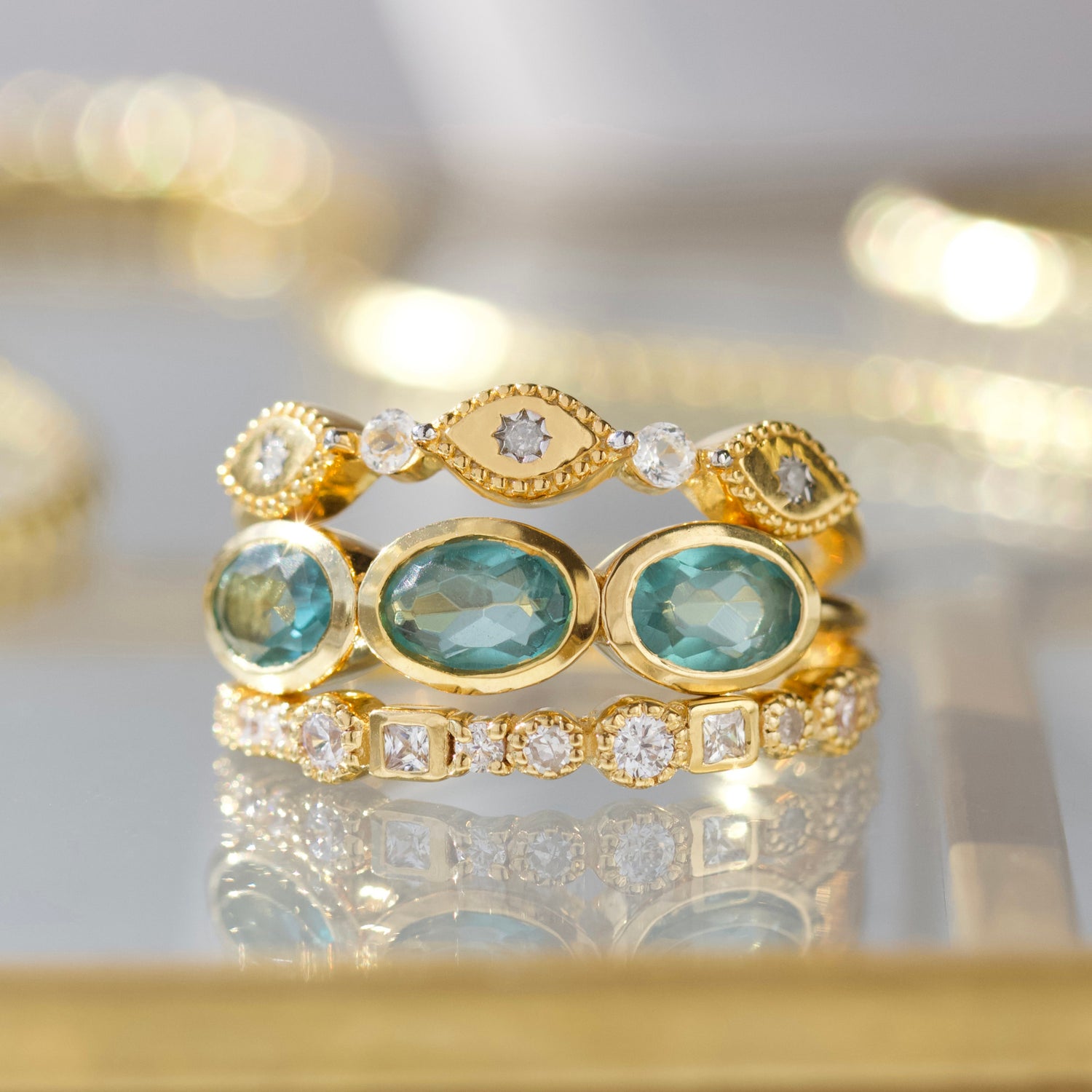 mixed stone and shape diamond and cz eternity ring in gold