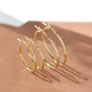 solid gold diamond cut hoop earrings