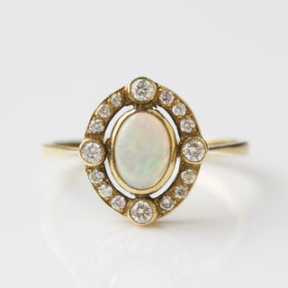 opal and diamond engagement ring in solid gold