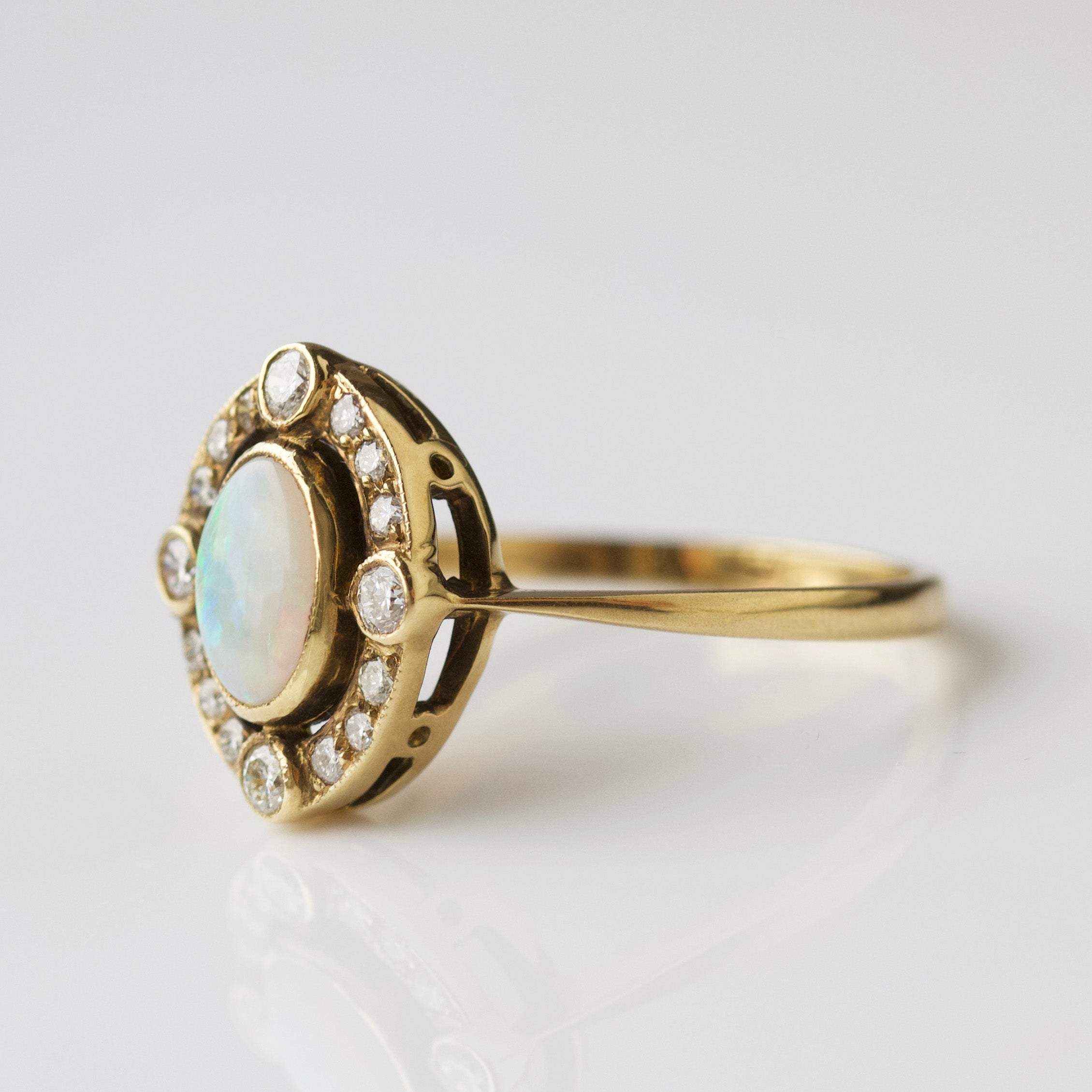 opal and diamond engagement ring in solid gold