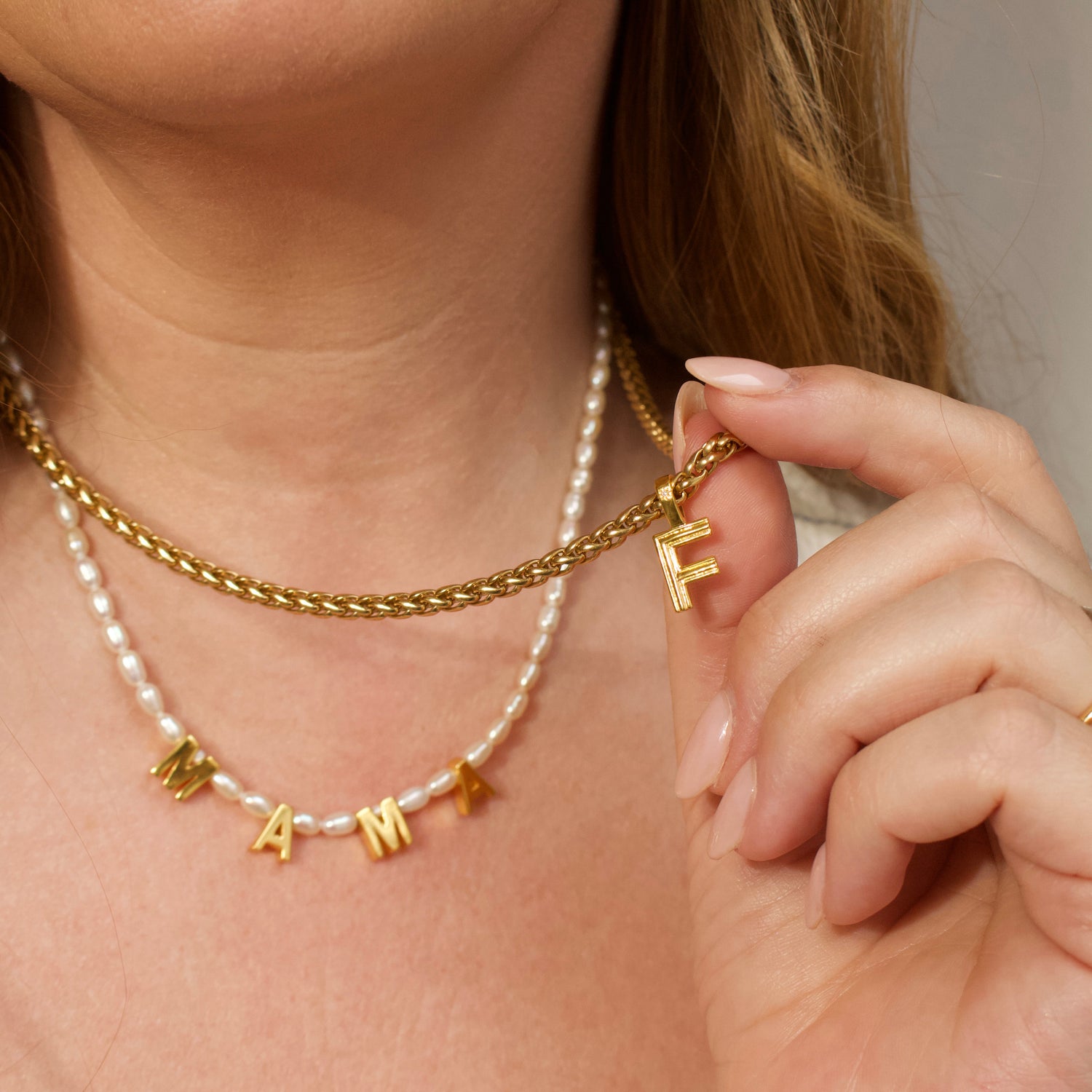 mama pearl word necklace in gold 