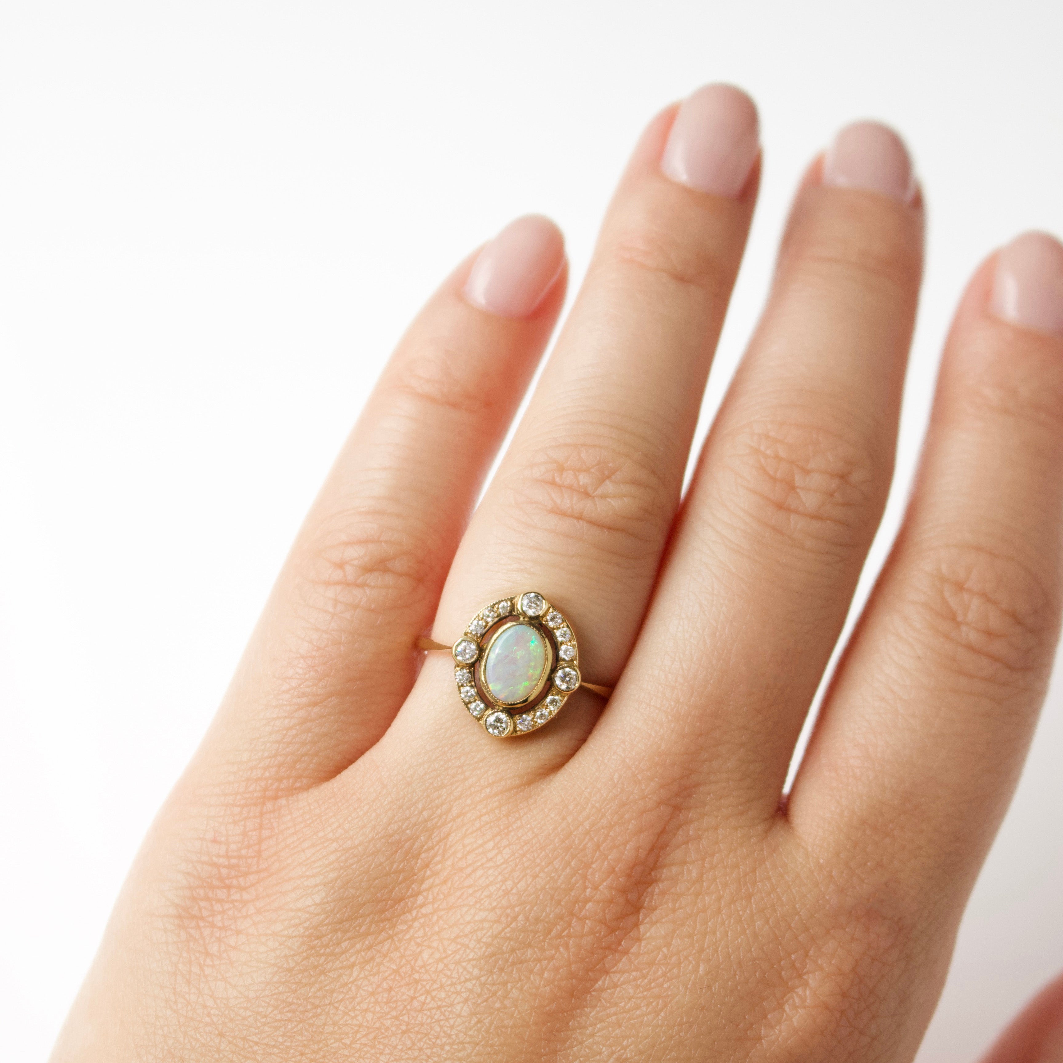 opal and diamond engagement ring in solid gold