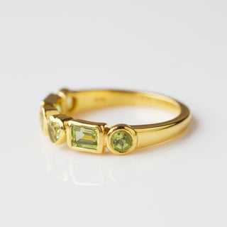 peridot heart and shape ring in gold