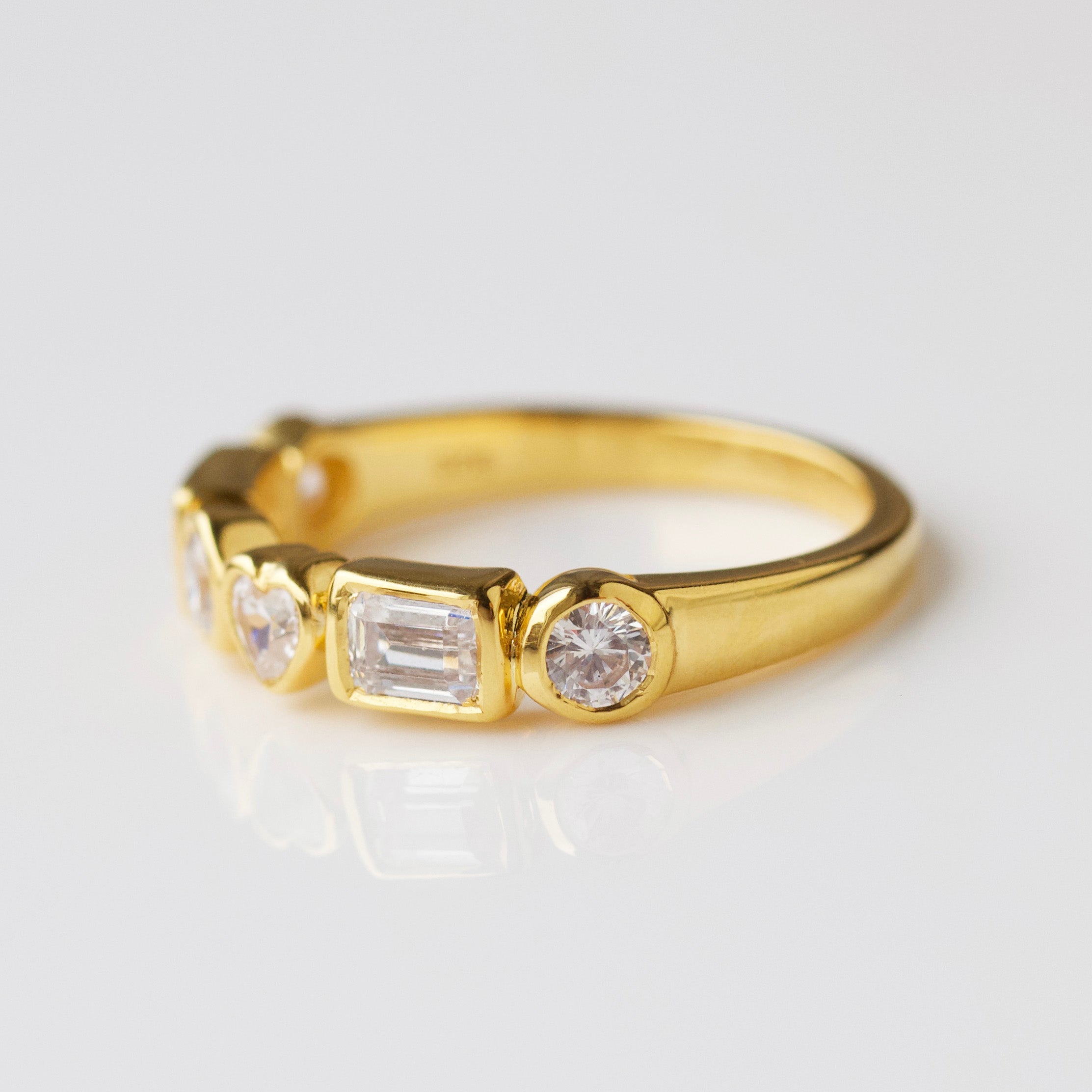 white zircon heart ring in gold