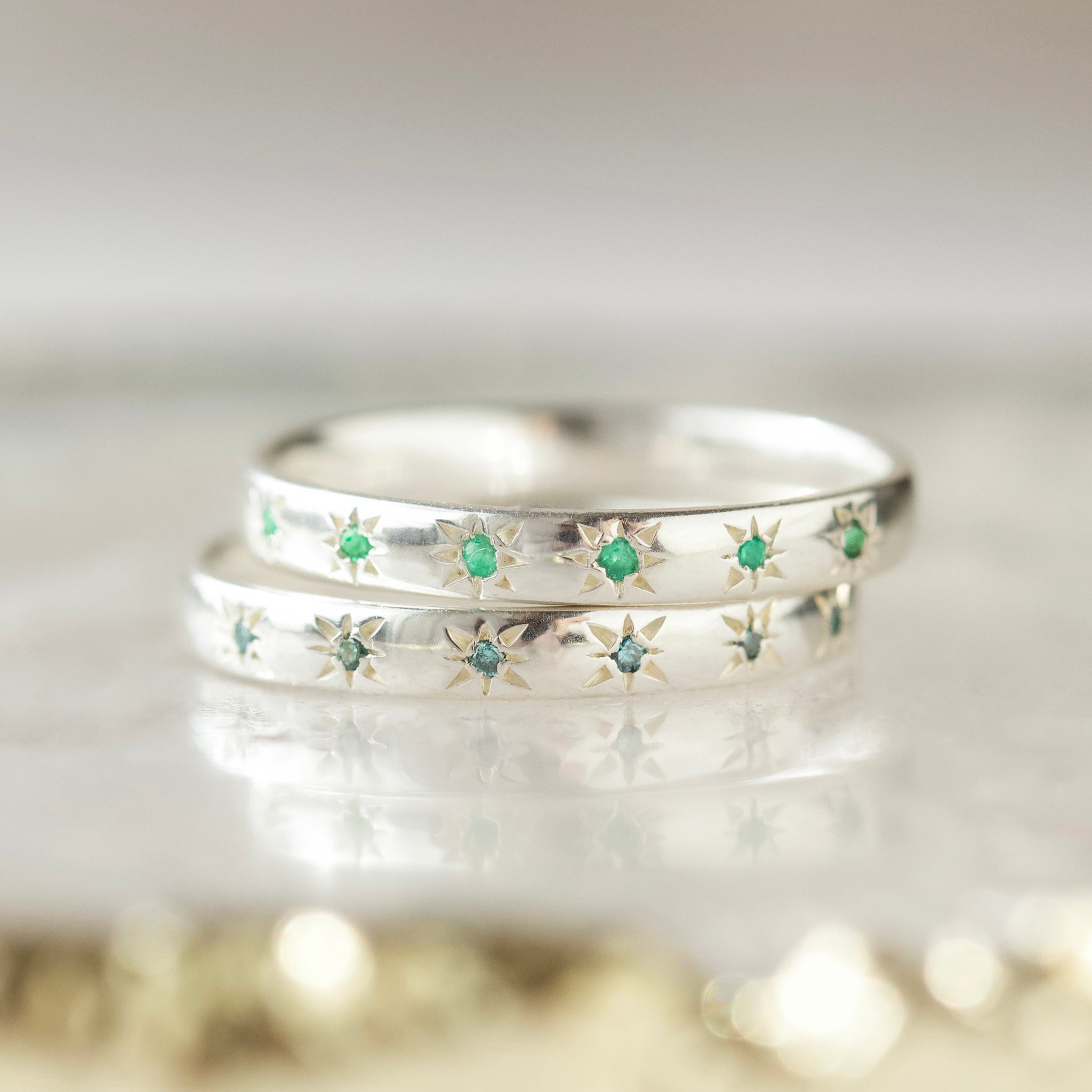 emerald star set ring in silver 