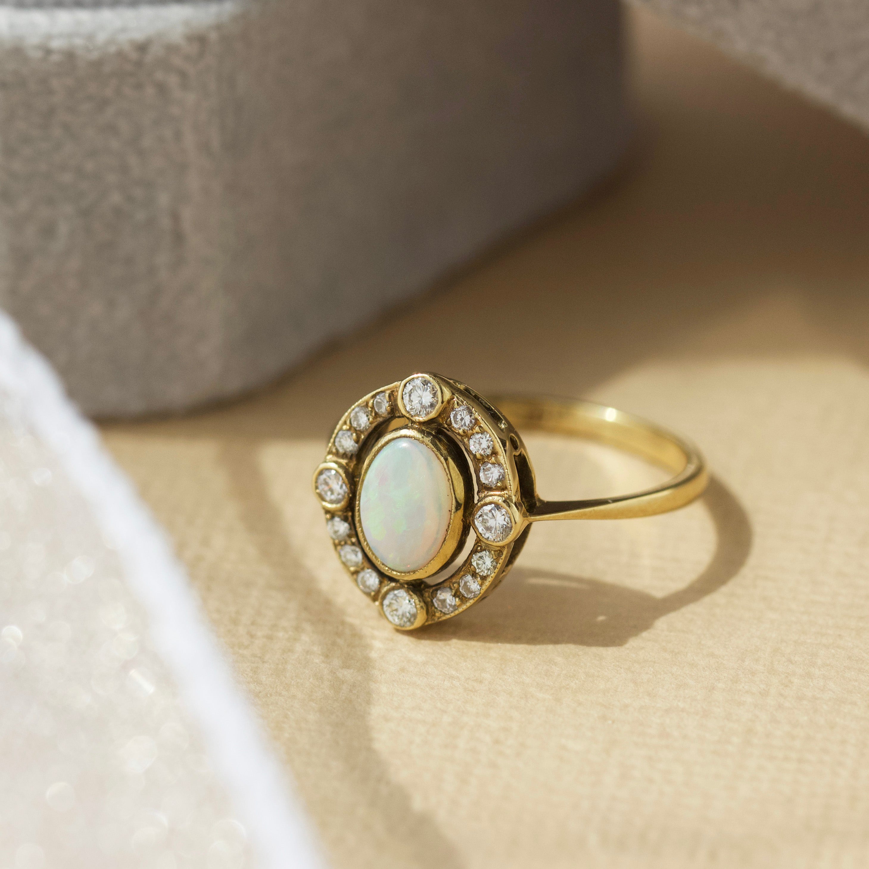 opal and diamond engagement ring in solid gold