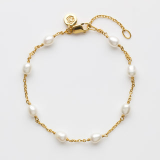 Organic pearl infinity bracelet in gold