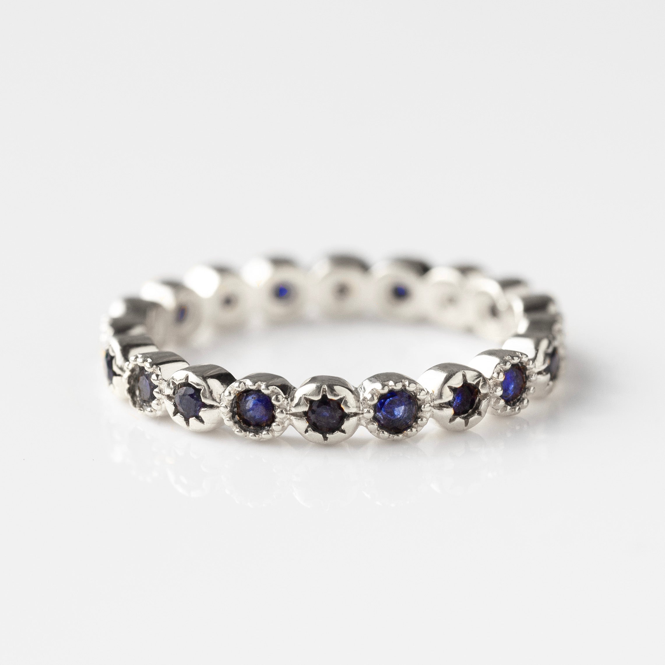 blue sapphire star eternity ring silver