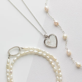 Organic pearl infinity bracelet in silver