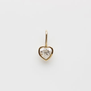 Diamond heart charm in solid gold