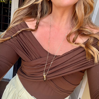 Long Gold necklace with secret compartment pendant