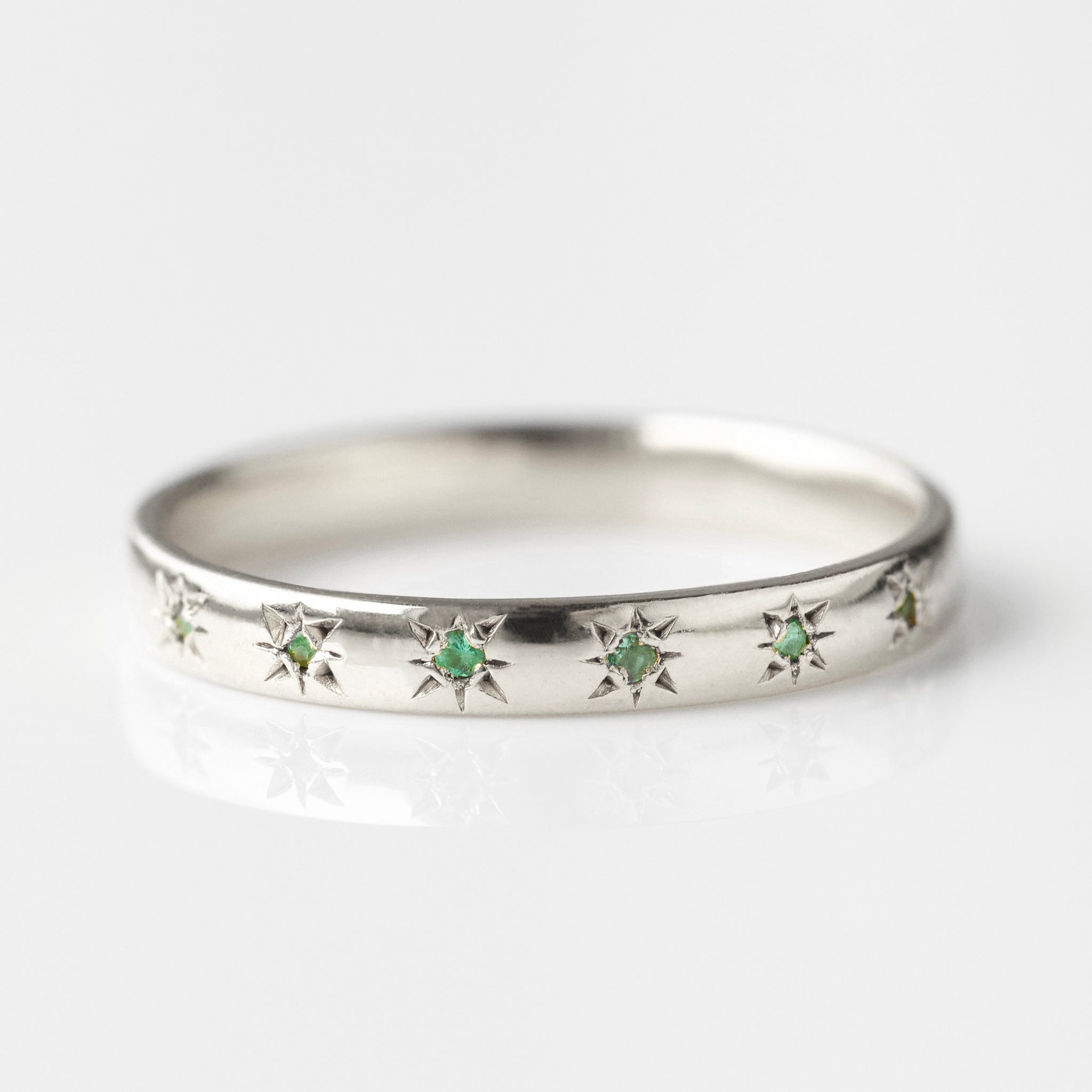 emerald star set ring in silver 