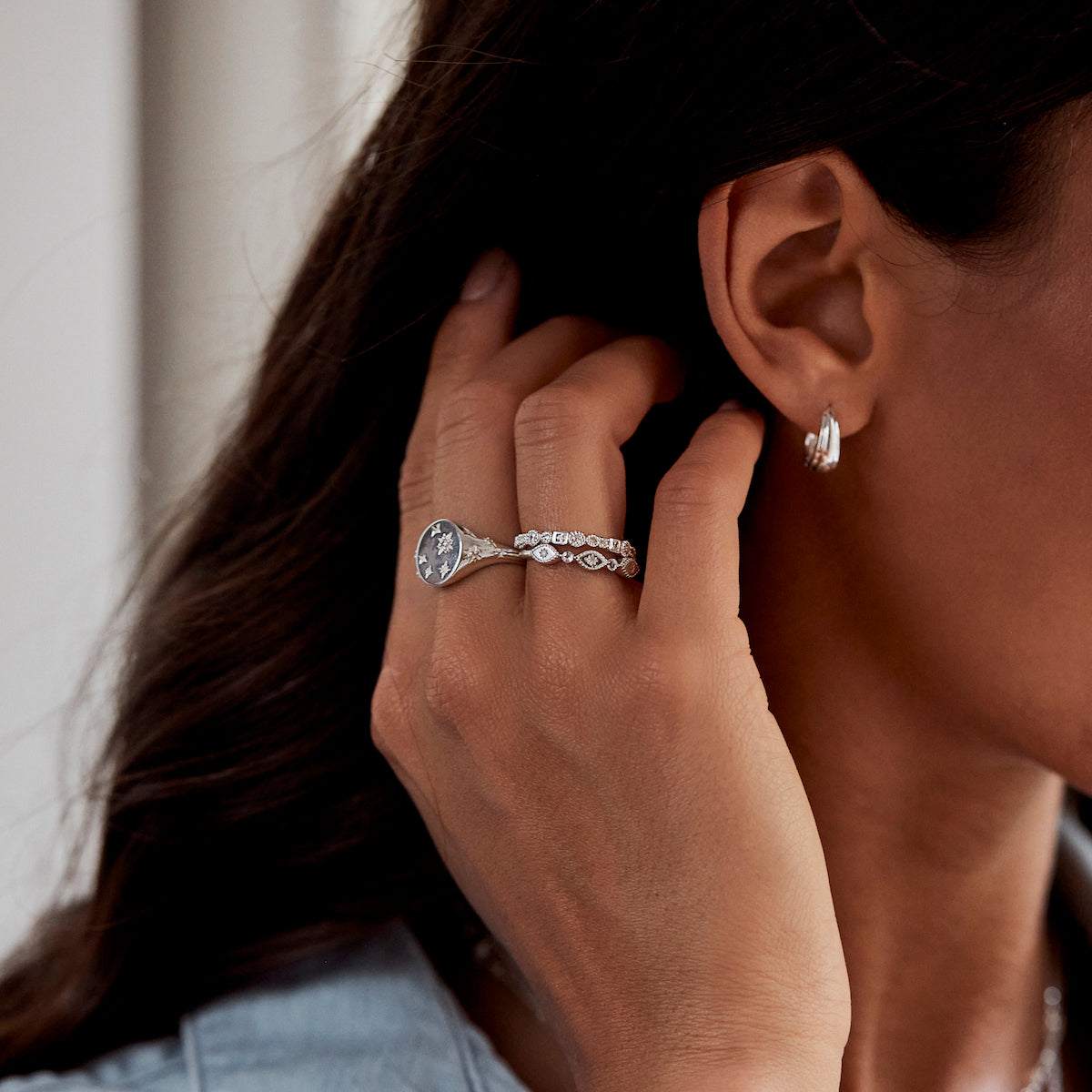 white topaz and diamond trapeze ring in silver