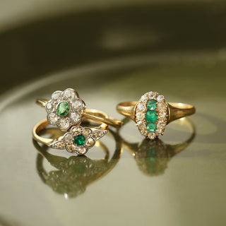 antique emerald diamond cluster ring